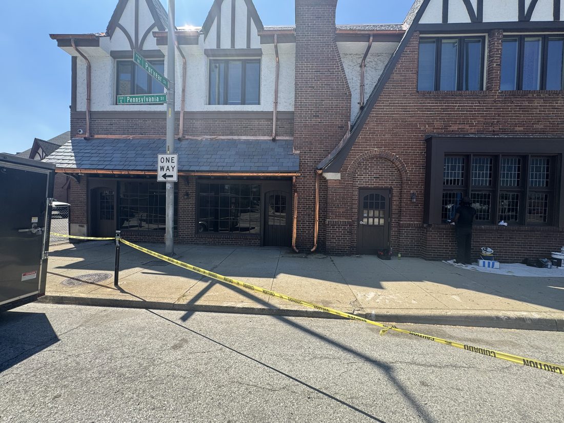 Storefront glass &mdash; installation in progress