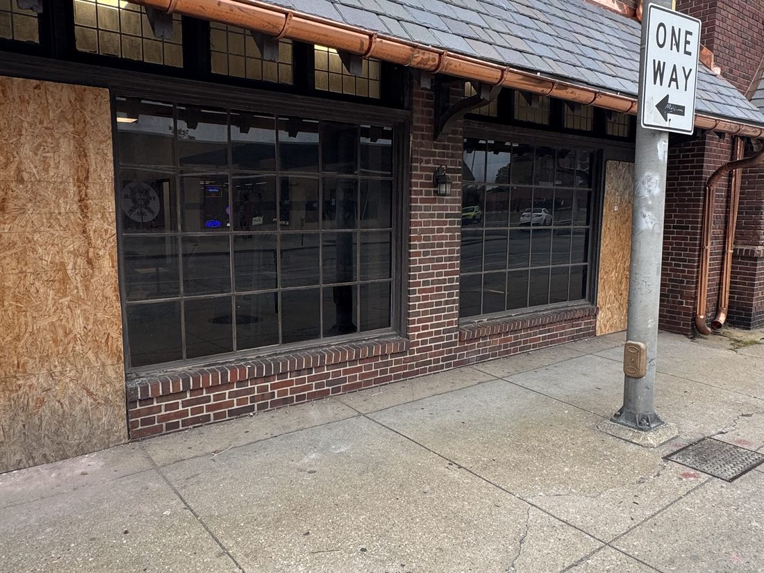 Commercial storefront, sidewalk view